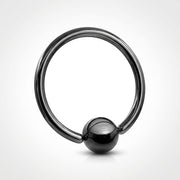 18G PVD coated steel fixed ball nose ring in metallic black, circular captive hoop style, three-quarter view