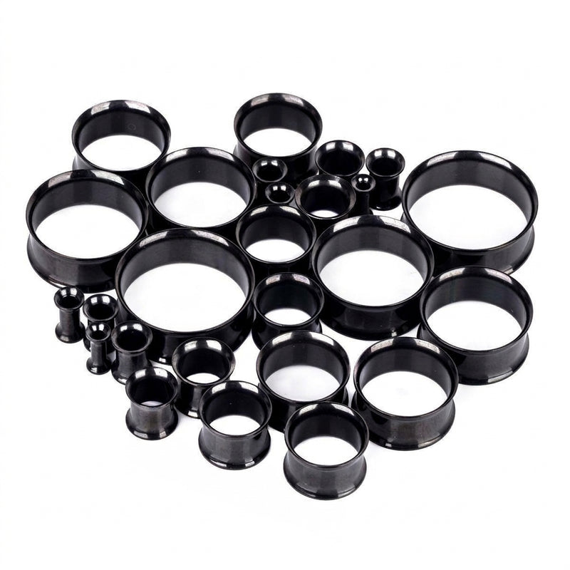 6G-1" PVD coated steel double flared eyelets with black finish, overhead view of multiple sizes
