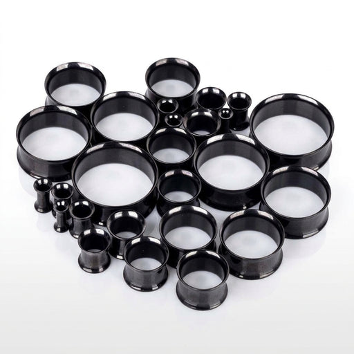 6G-1" PVD coated steel double flared eyelets with a black finish, multiple sizes in a three-quarter view