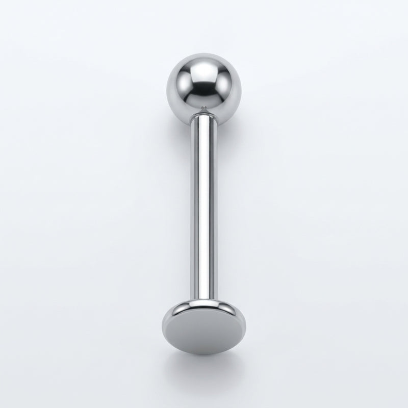 16G titanium labret lip ring with a straight post, flat back disc, and 3mm ball end, overhead view