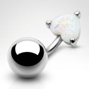14G surgical steel navel ring with a polished ball and a white glitter opal heart, close-up view
