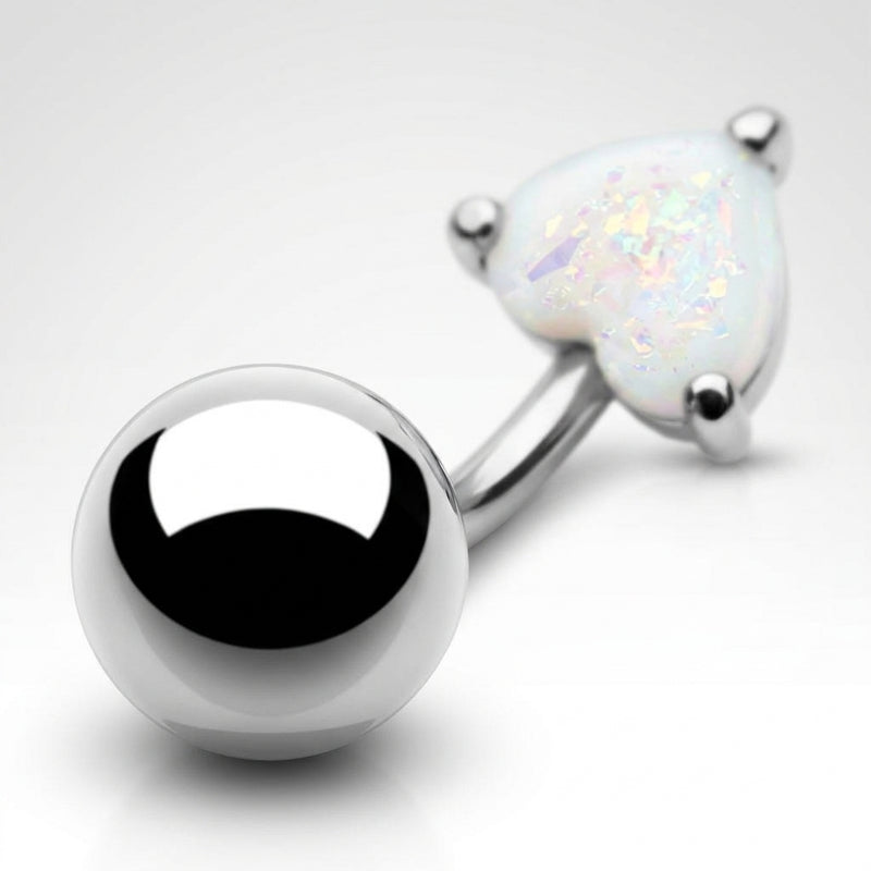 14G surgical steel navel ring with a polished ball and a white glitter opal heart, close-up view