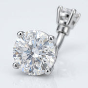 14G surgical steel navel ring with double clear round CZ gems in a prong setting, close-up view
