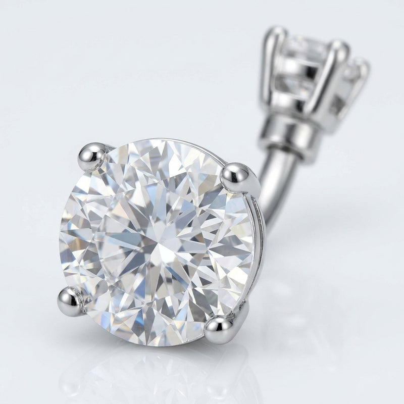 14G surgical steel navel ring with double clear round CZ gems in a prong setting, close-up view