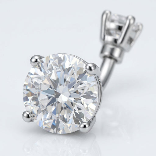 14G surgical steel navel ring with double clear round CZ gems in a prong setting, close-up view