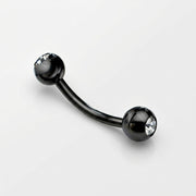 16G black PVD coated steel curved eyebrow barbell with clear CZ gem ball ends, three-quarter view