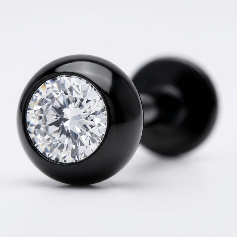 16G black surgical steel labret stud featuring a clear CZ gem set in a black ball end, close-up detail
