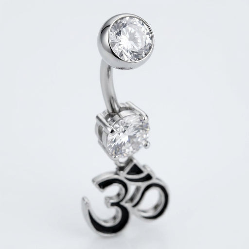 14G surgical steel navel ring with double clear CZ gems and a dangling black enamel Om symbol, close-up view