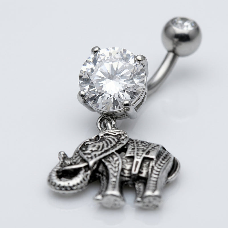 14G surgical steel navel ring with large clear prong-set CZ gem and dangling detailed elephant charm, close-up
