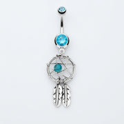 14G surgical steel belly ring with blue CZ gems, dreamcatcher dangle with turquoise bead and feathers, top view