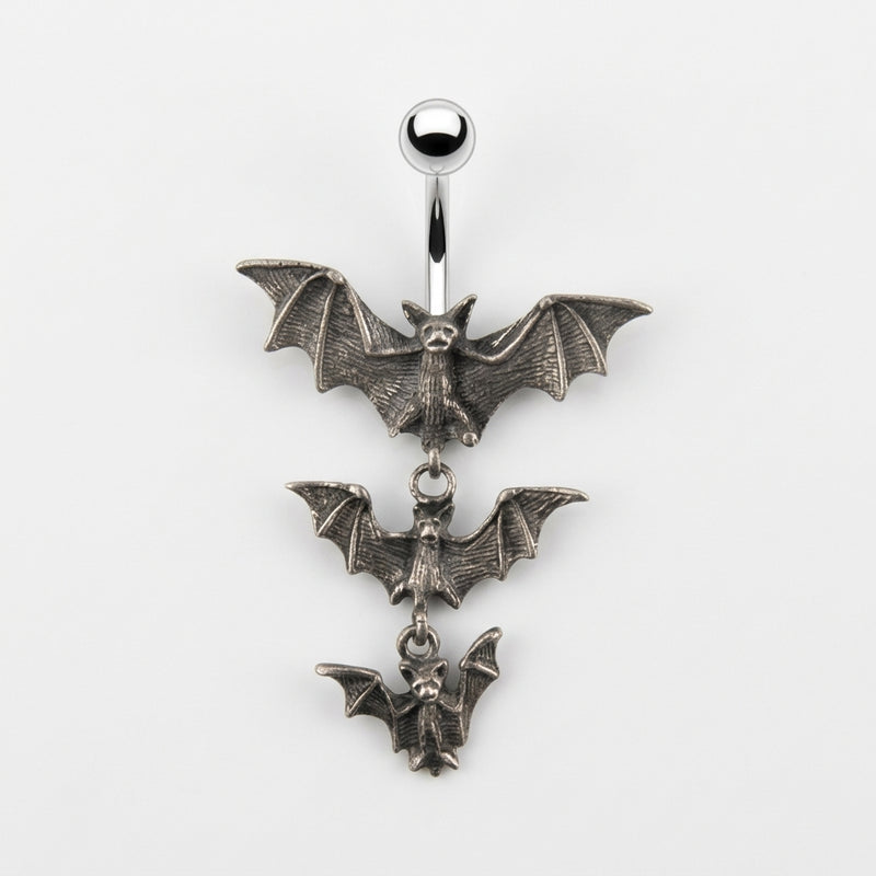 14G surgical steel navel ring with a polished top ball and three dangling antique silver bats of decreasing sizes.