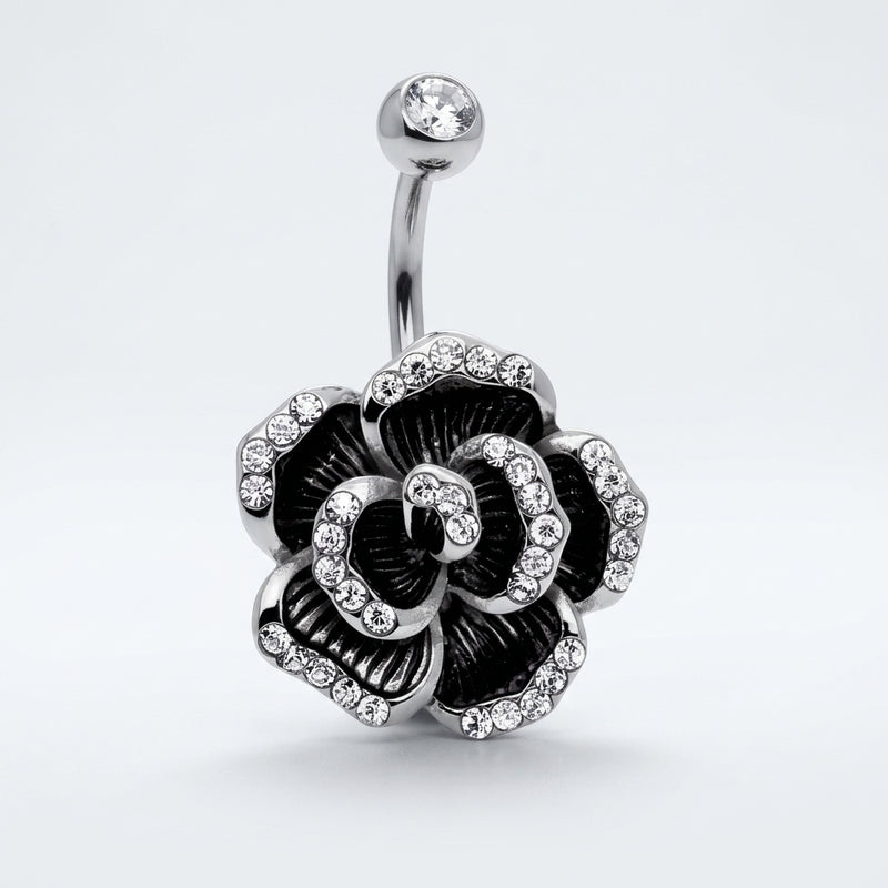 14G surgical steel navel ring with clear gem top ball and CZ-lined rose flower, three-quarter view