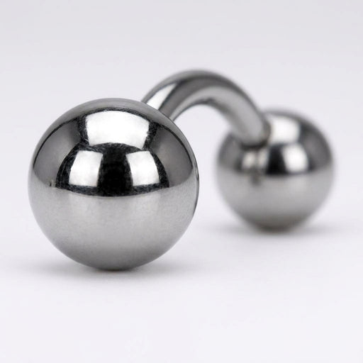 16G titanium curved eyebrow barbell with plain polished ball ends, close-up detail on a white background