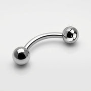 16G titanium curved eyebrow barbell with highly polished metal ball ends, three-quarter view on white