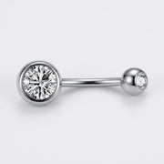 14G titanium navel ring with double clear bezel-set CZ gems, flat-lay view on white background