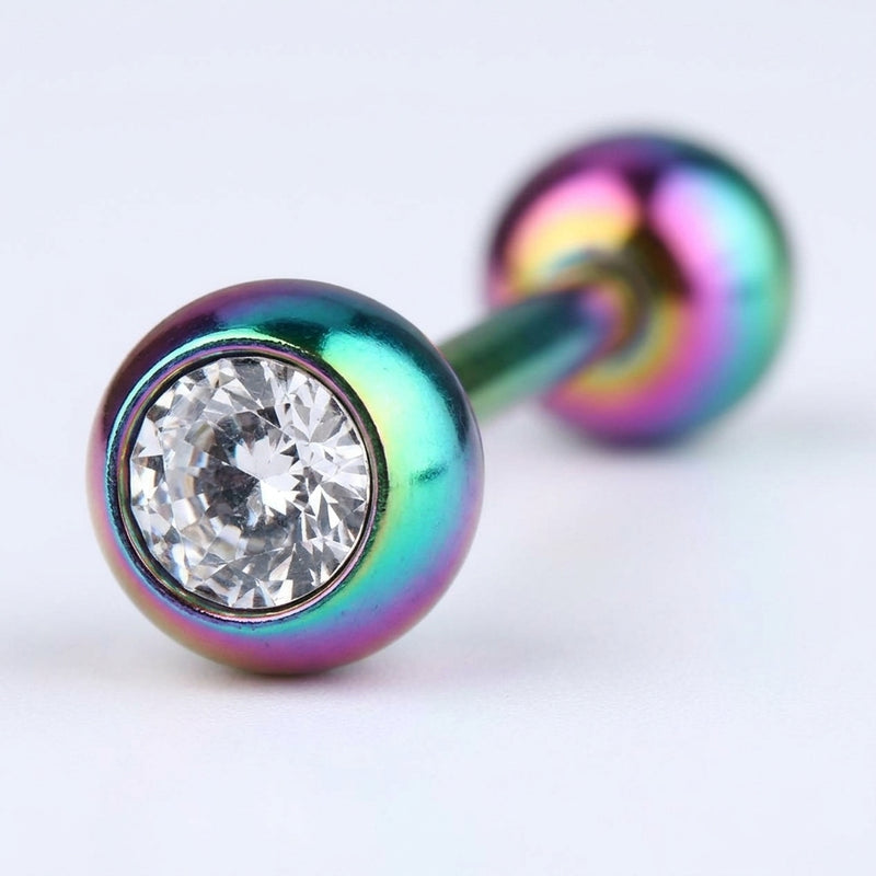 14G PVD coated steel tongue ring with colorful rainbow ball ends and a clear CZ gem, close-up view