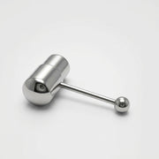 14G surgical steel tongue ring with vibrating capsule and ball end, three-quarter view on white