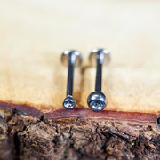 16G titanium labret stud with 2mm and 3mm cubic zirconia gems for comfortable lip piercing. Internally threaded design for easy wear.