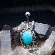 14G surgical steel belly ring with big turquoise stone, externally threaded design for secure installation and 18mm length.