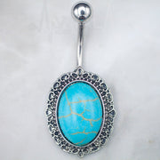 14G surgical steel belly ring with a large turquoise stone, externally threaded design for secure installation and comfort