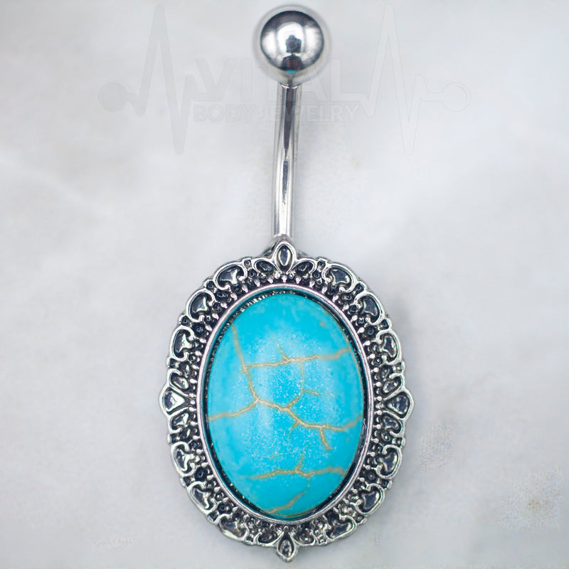 14G surgical steel belly ring with a large turquoise stone, externally threaded design for secure installation and comfort
