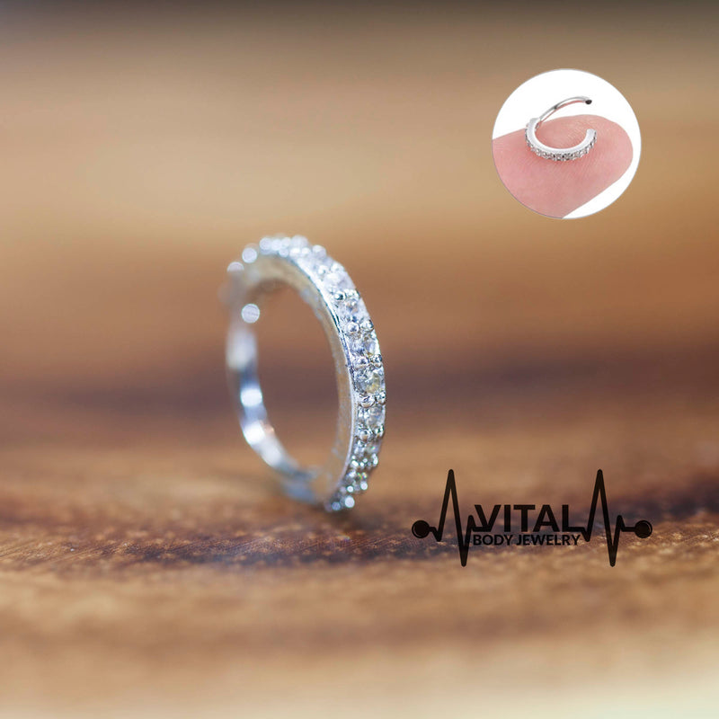 20G annealed steel bendable hoop ring with 15 sparkling gems, designed for comfortable wear in various piercings.