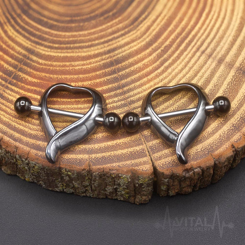 14G surgical steel heart-shaped nipple shields with external threading, hypoallergenic design for sensitive skin.