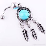 14G surgical steel belly button ring with dream catcher design and turquoise semi-precious stone, featuring delicate dangling leaves for a unique style.