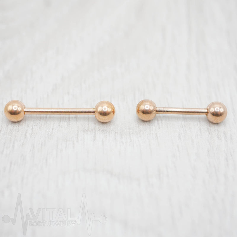 14G PVD coated surgical steel nipple barbell with a smooth black finish, featuring 5mm ball ends and externally threaded design for secure wear