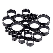 6GA PVD coated surgical steel double flared tunnel eyelets with a sleek black finish for secure and comfortable wear