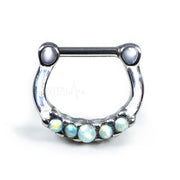 16G surgical steel septum ring with five white opals reflecting light, designed for comfortable wear with a clicker mechanism