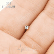 18G titanium corkscrew nose stud with 2mm cubic zirconia gem for a secure and stylish fit