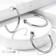 18G titanium adjustable open hoop nose ring with a smooth 2mm disk for customizable comfort and style.