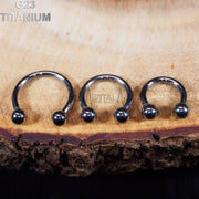 14G titanium septum ring with internally threaded design for comfortable wear, available in multiple diameters for a perfect fit.