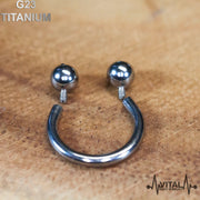 14G titanium septum ring with internally threaded design and smooth mirror finish for comfortable wear. Available in multiple diameters.