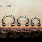 16G titanium septum ring with internally threaded design and 3mm ball end for comfortable wear and easy insertion