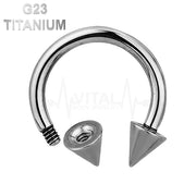 14G titanium septum ring with horseshoe design and spike ends, crafted for comfort and secure fit, ideal for sensitive skin