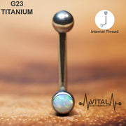 14G titanium vertical hood barbell with white opal gem, elegantly designed for comfort and a secure fit, featuring an internally threaded style.