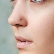 18G titanium corkscrew nose stud with ball, dome, and spike end options for versatile styling