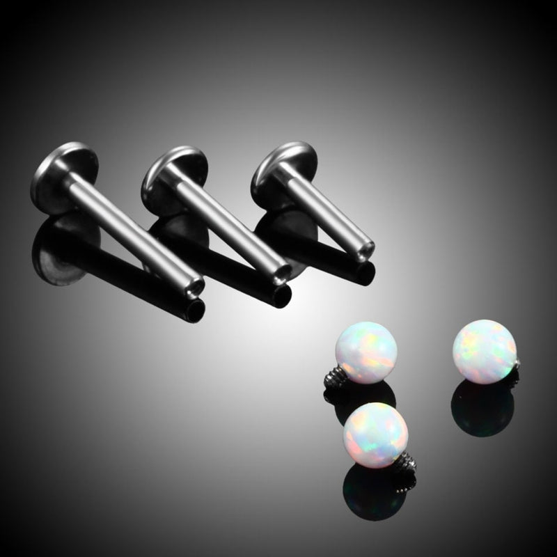 16G surgical steel labret stud with opal gem for Monroe, lip, ear, cartilage, tragus, or helix piercings. Internally threaded design for easy wear.