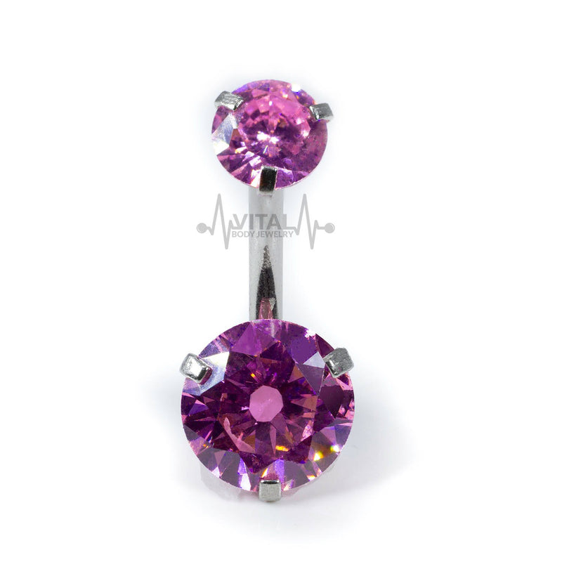 14G titanium navel ring with double cubic zirconia gems, internally threaded for comfort and a smooth fit.