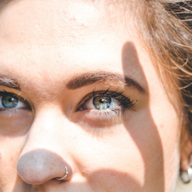 20G surgical steel captive bead ring with fixed 3mm ball for cartilage, earlobe, tragus, and nostril piercings