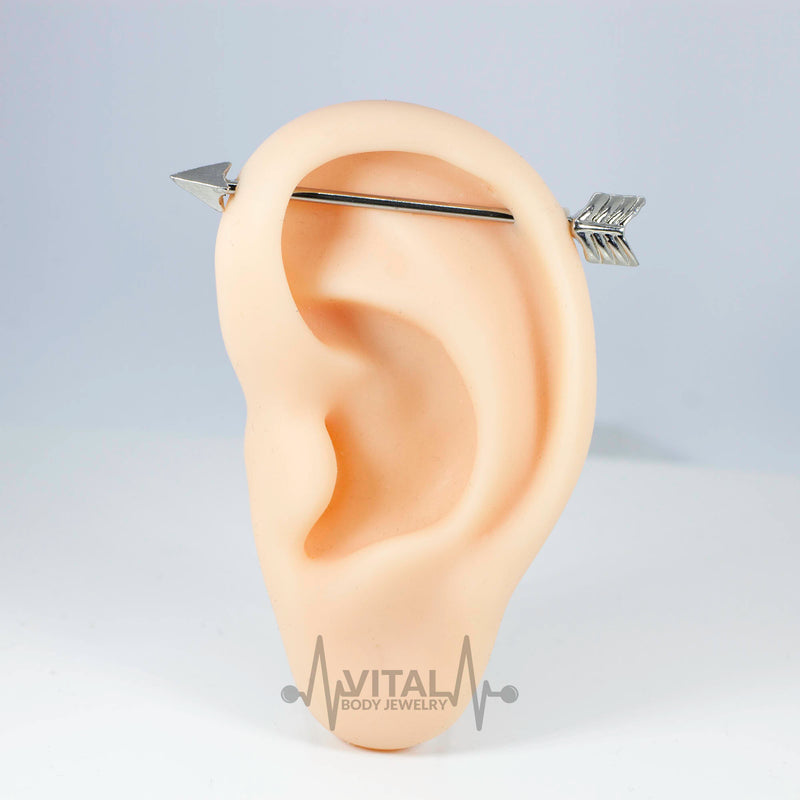 14G PVD coated surgical steel industrial barbell with striking arrow design, ideal for various piercings and daily wear.