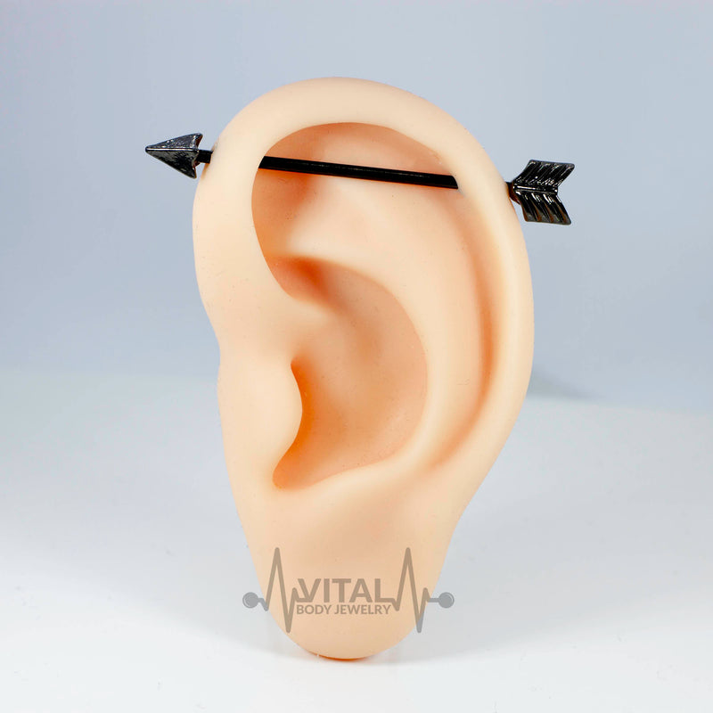 14G PVD coated surgical steel industrial barbell with arrow design for a bold and stylish look in piercings