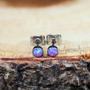 20G titanium stud earrings with 4mm opal stones in white, aqua, and purple colors for everyday wear.