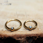 16G titanium nose ring with a 3mm gem ball, featuring a PVD coating for durability and a captive bead design for secure wear