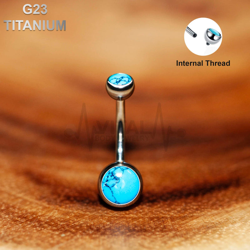 14G titanium belly ring with turquoise stones on ball ends, internally threaded design for smooth insertion and comfort during wear