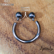 16G titanium septum ring with internally threaded design for smooth insertion, featuring a 3mm ball for secure wear and comfort