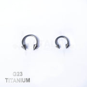 14G titanium septum ring with spike ends, externally threaded design for secure fit, available in 3/8" and 1/2" sizes.