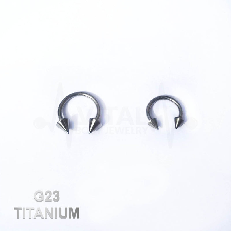 14G titanium septum ring with spike ends, externally threaded design for secure fit, available in 3/8" and 1/2" sizes.